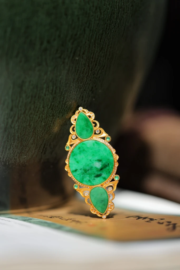 A full green jade brooch, a beloved design that...