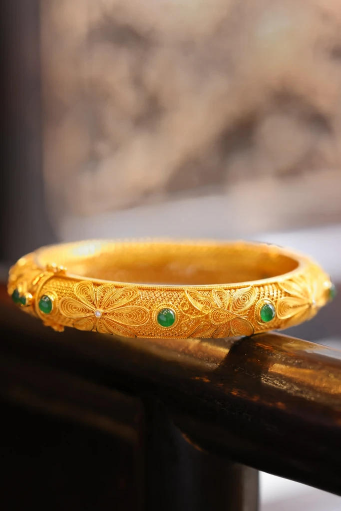 This heavyweight filigree bracelet, crafted with...