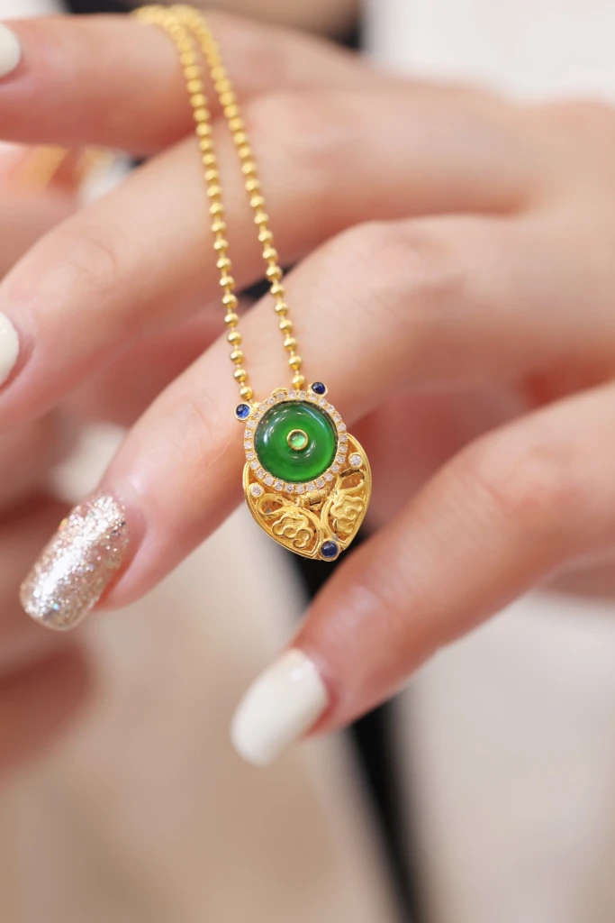 This stunning jade pendant in 18k gold is a real...