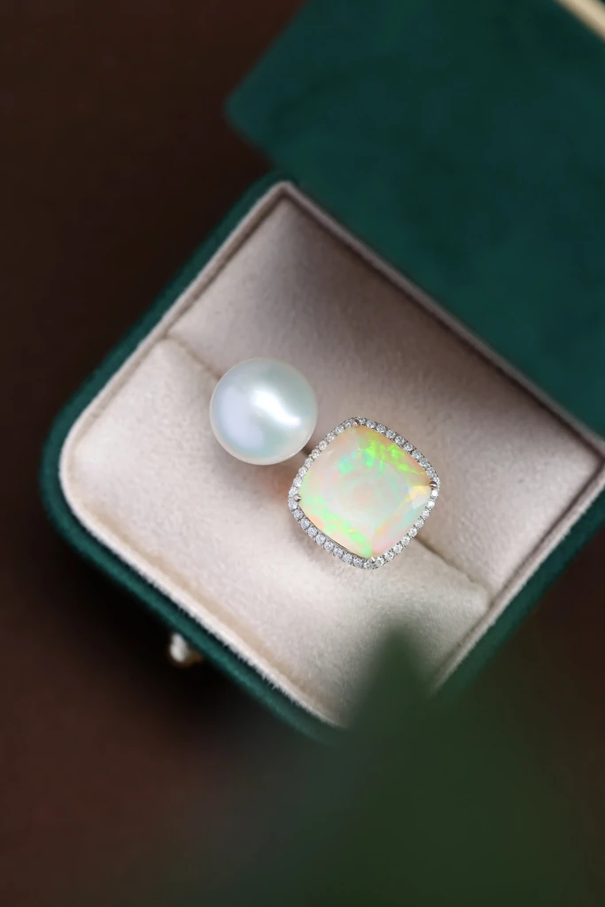 This ice crystal, iridescent pearl opal ring is...