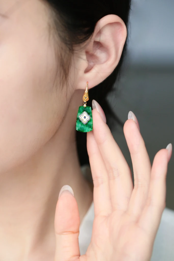 Minimalist yet subtly designed jade earrings are...