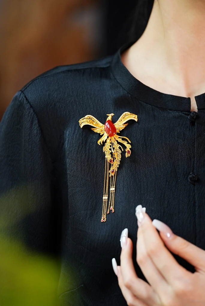 The phoenix brooch and pendant, a dual-purpose p...