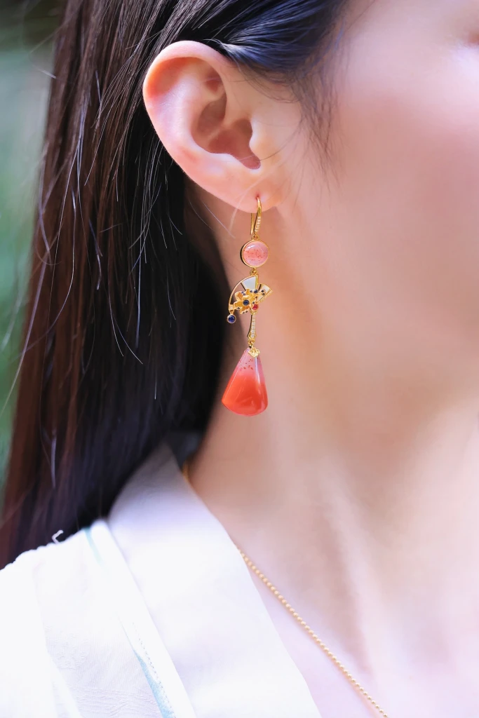 These earrings are a stunning addition to any be...