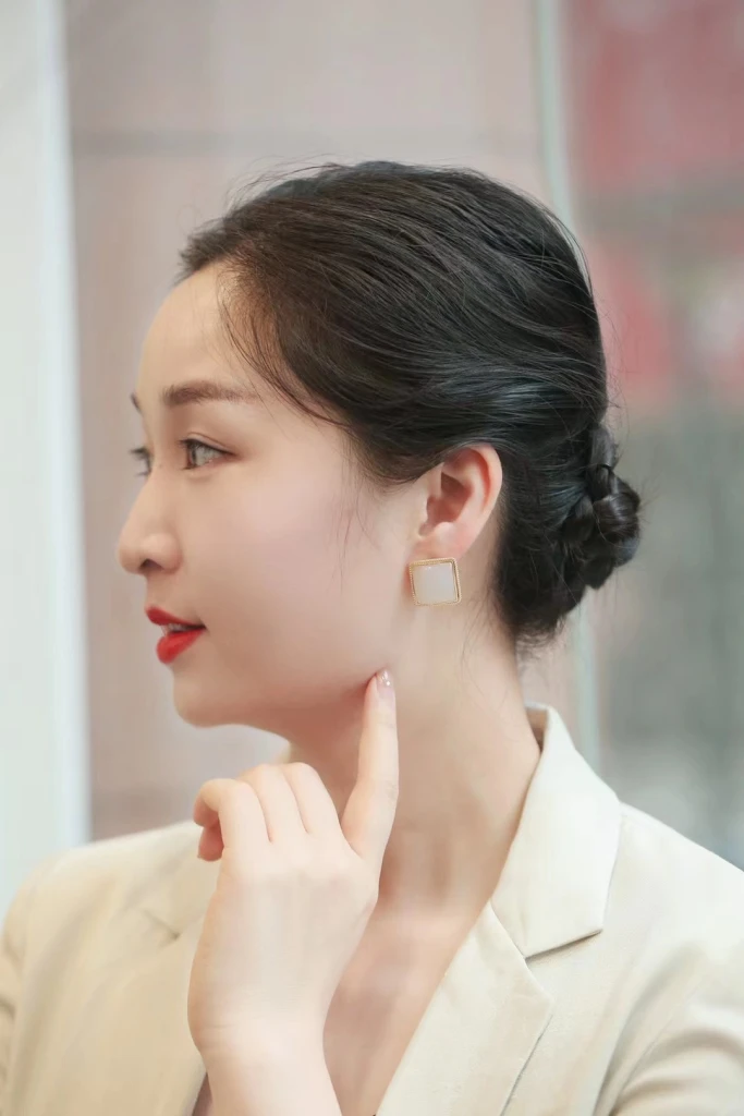 These rock sugar and Hetian white jade earrings...