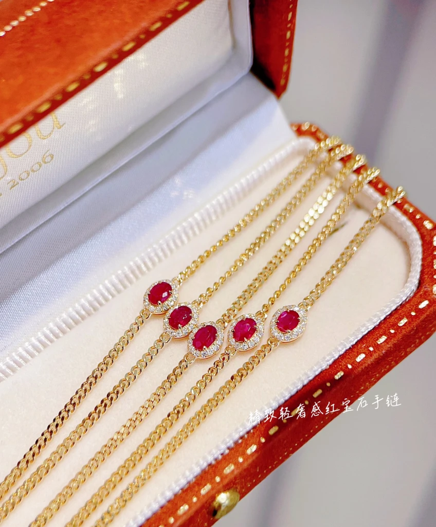 This 18k gold diamond and natural ruby bracelet...