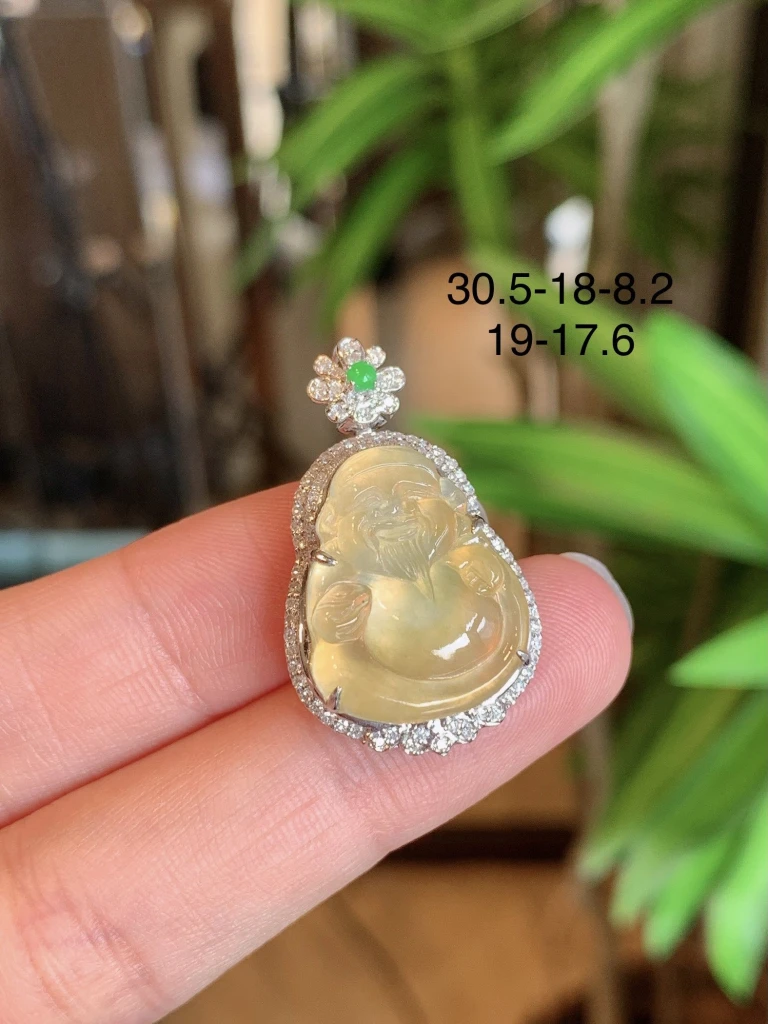 This exquisite ice-yellow jade pendant features...